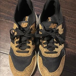 New Balance 7 1/2. Worn only twice.